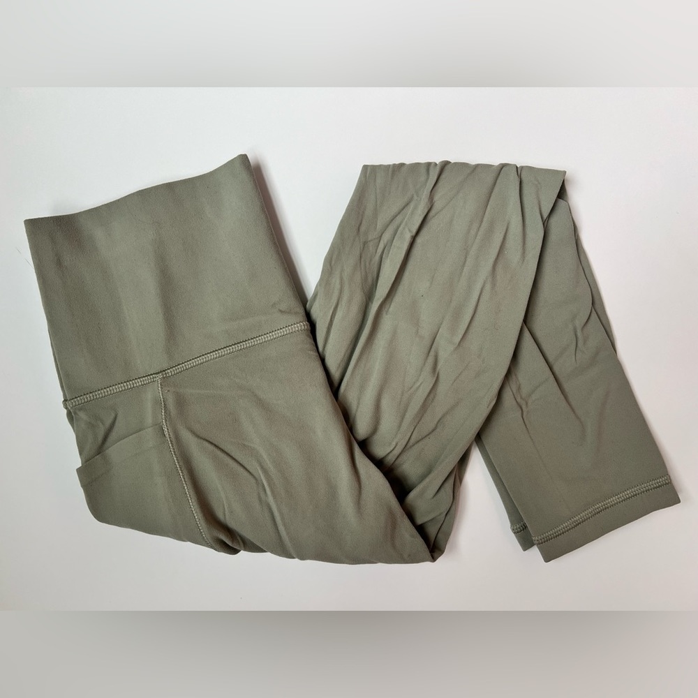 Athleta Sage Green Salutation 7/8 Stash Tight